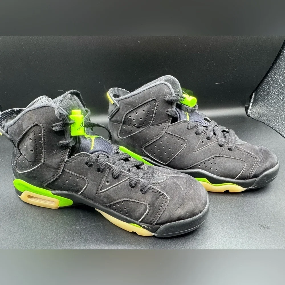 Jordan Black and Green Sneakers with Air Unit and Perforated Panels
